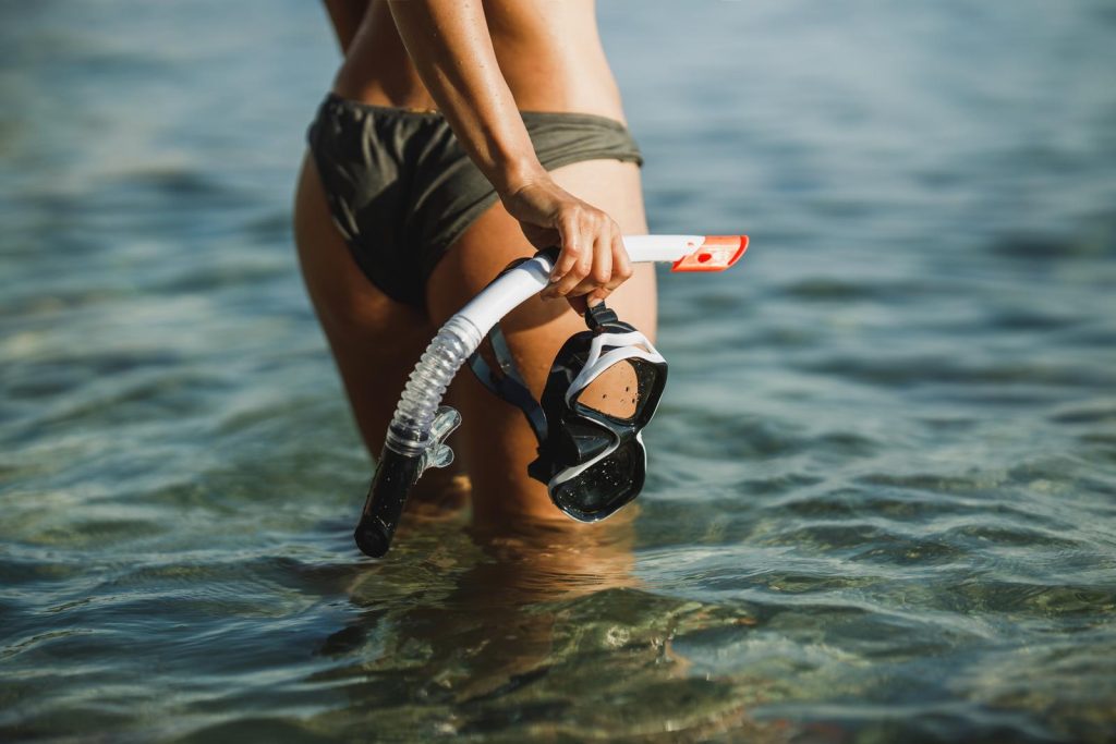 Close Up Of A Woman With Mask And Snorkel
